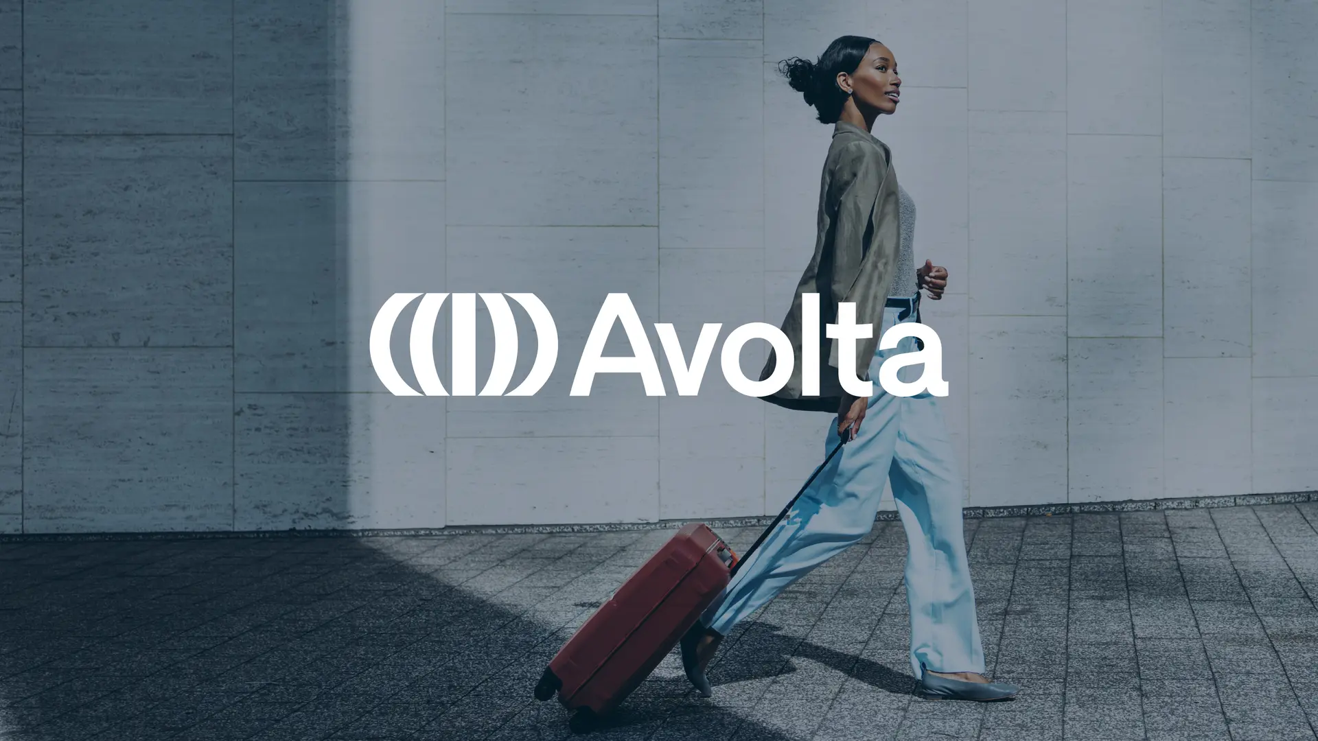 Avolta Lady Walking with Suitcase