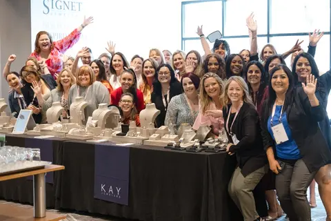 Signet staff at a counter