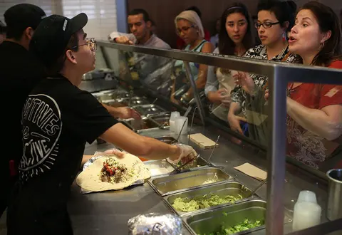 Customers being served in Chipotle